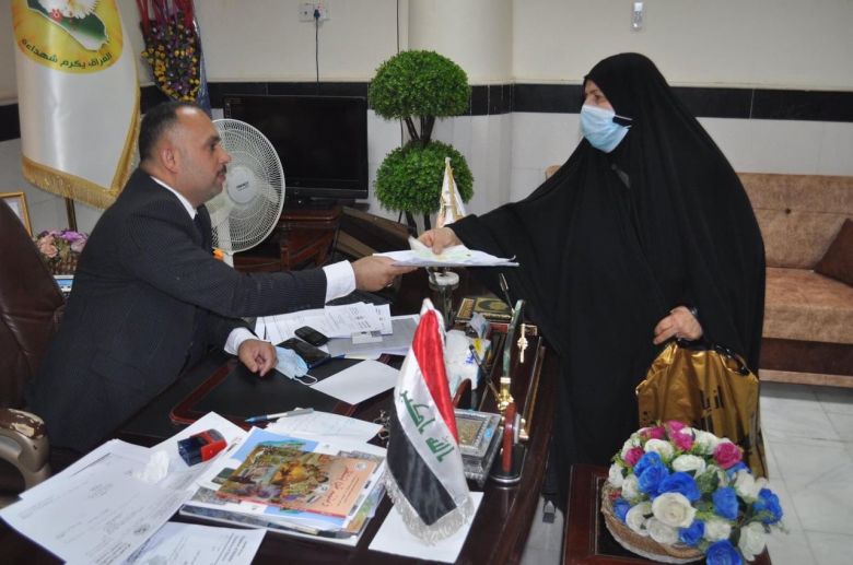 مديرية شهداء كربلاء توزع المنحة العقارية على ذوي الشهداء
