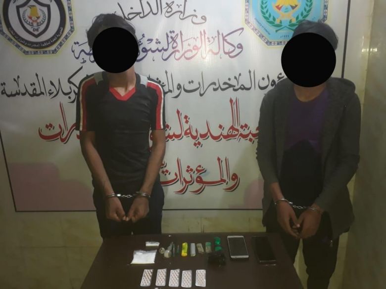 شرطة كربلاء تحكم قبضتها على مروجين للمواد المخدرة