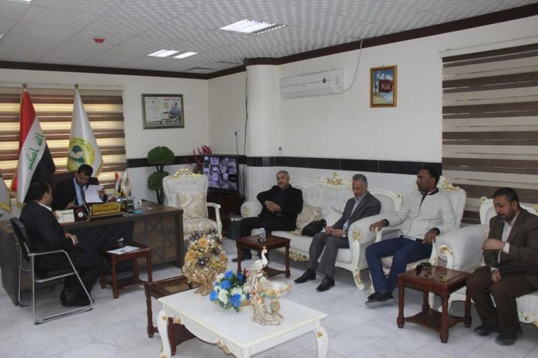 وفد من نقابة الصحفيين في زيارة مؤسسة الشهداء